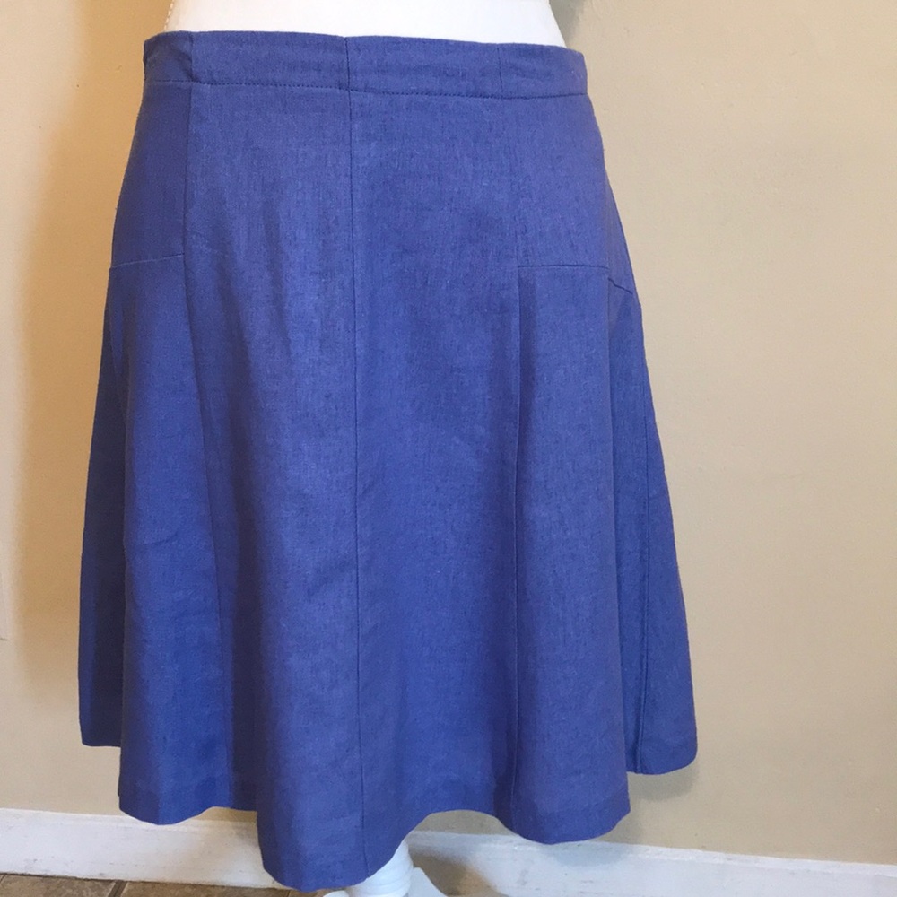 A knee length purple skirt